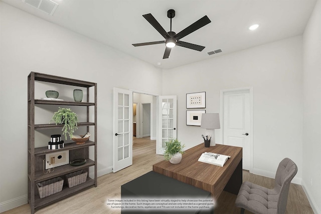 office featuring light hardwood / wood-style flooring, ceiling fan, and french doors