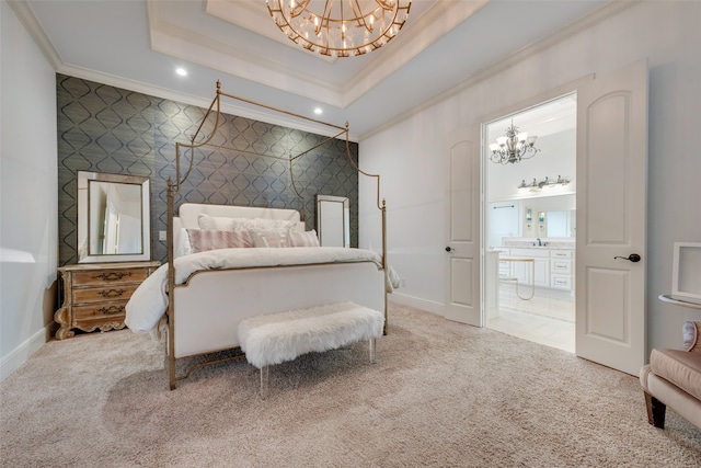 bedroom with carpet floors, crown molding, a tray ceiling, and a chandelier