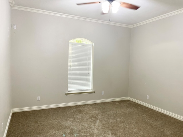 carpeted empty room featuring ceiling fan and ornamental molding