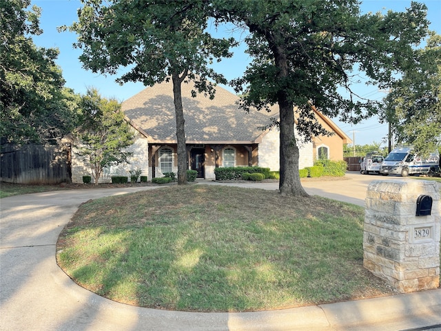 view of front of home with a front yard