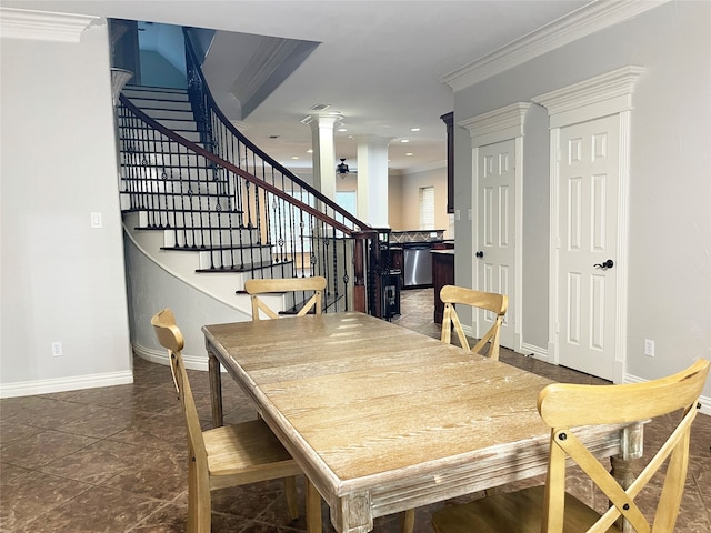 dining area featuring ornate columns, crown molding, and tile patterned flooring