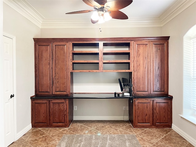 unfurnished office featuring ornamental molding, ceiling fan, and tile patterned flooring