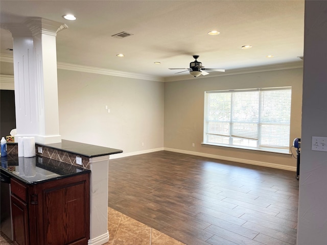 interior space with ornamental molding, ornate columns, light hardwood / wood-style flooring, and ceiling fan