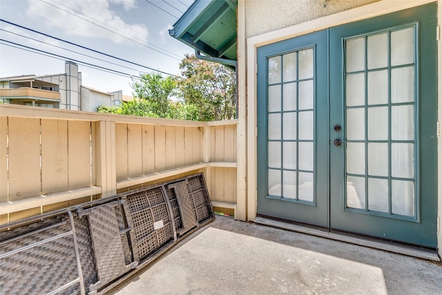 entryway featuring french doors