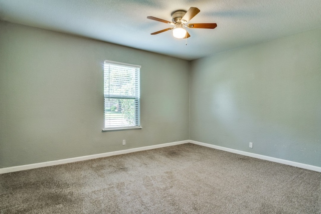 unfurnished room featuring carpet flooring and ceiling fan