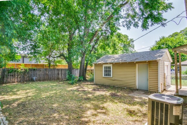 view of yard featuring central AC