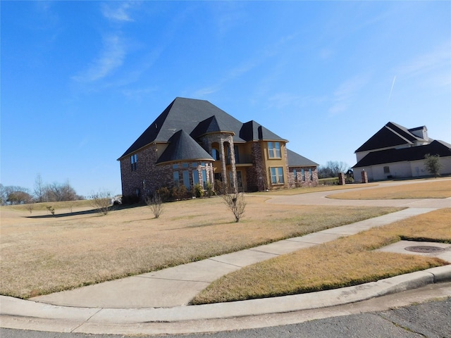 view of front of home with a front lawn