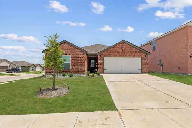 view of front of home with a garage and a front lawn