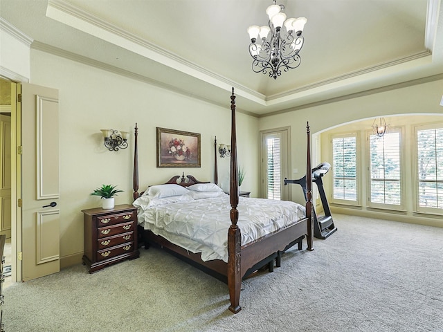 bedroom with light carpet, crown molding, a raised ceiling, and an inviting chandelier