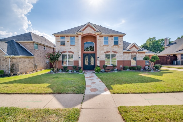 view of front of home featuring a front yard