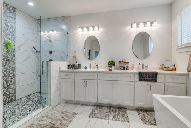 bathroom with marble finish floor, a marble finish shower, and double vanity