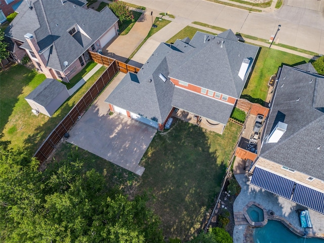 birds eye view of property with a residential view