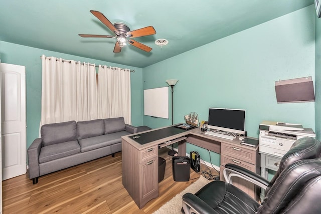 office area featuring light hardwood / wood-style flooring and ceiling fan