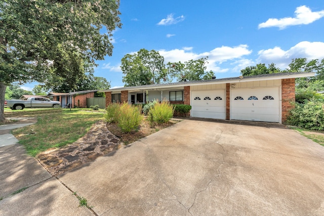 single story home with a garage