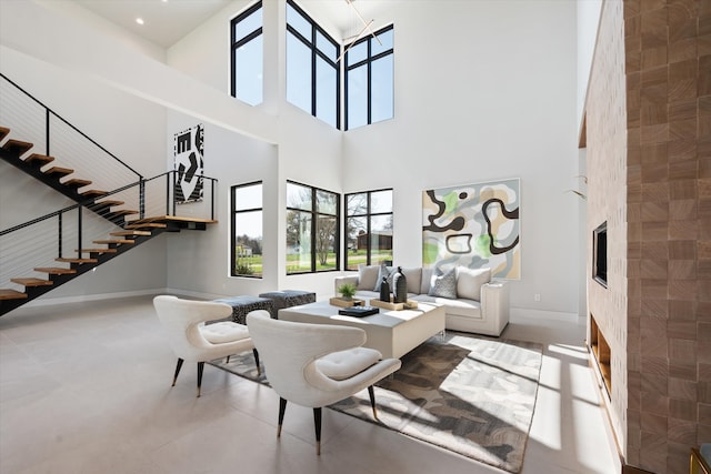 living room featuring a high ceiling