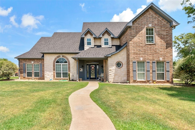 view of front of home featuring a front lawn