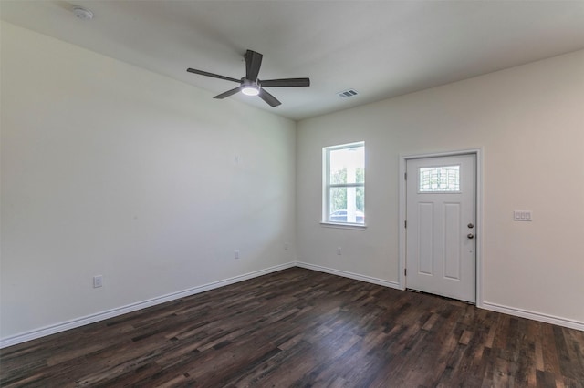 foyer featuring ceiling fan and dark wood-type flooring