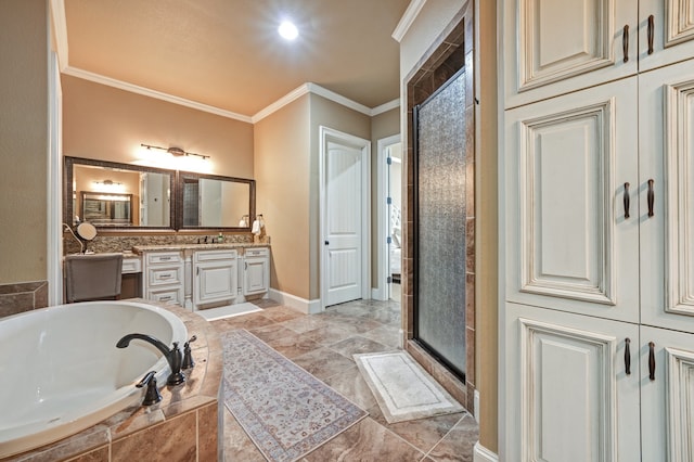 bathroom with vanity, ornamental molding, and independent shower and bath