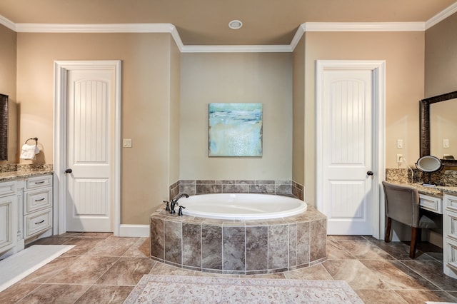 bathroom with vanity, tiled bath, and crown molding