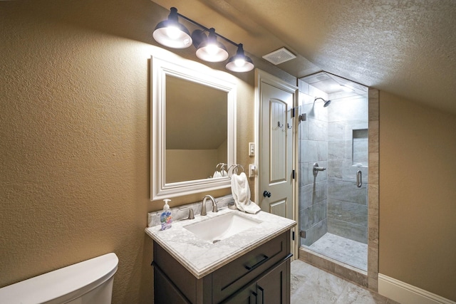 bathroom with lofted ceiling, toilet, a textured ceiling, vanity, and a shower with door