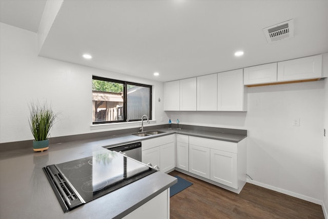 kitchen with sink, white cabinetry, stainless steel dishwasher, and black electric cooktop