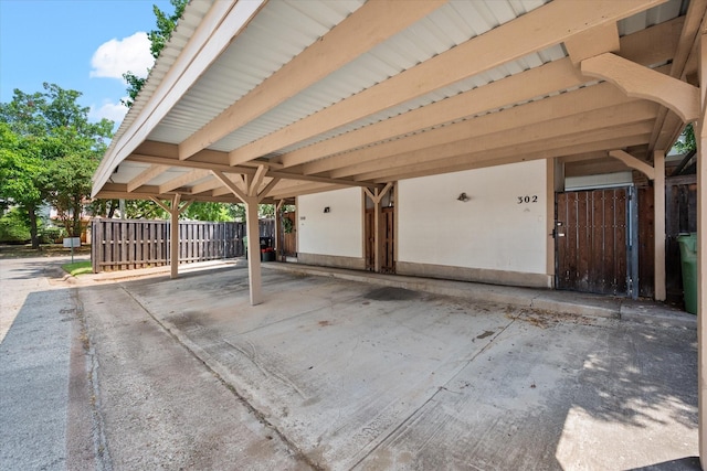 exterior space with a carport