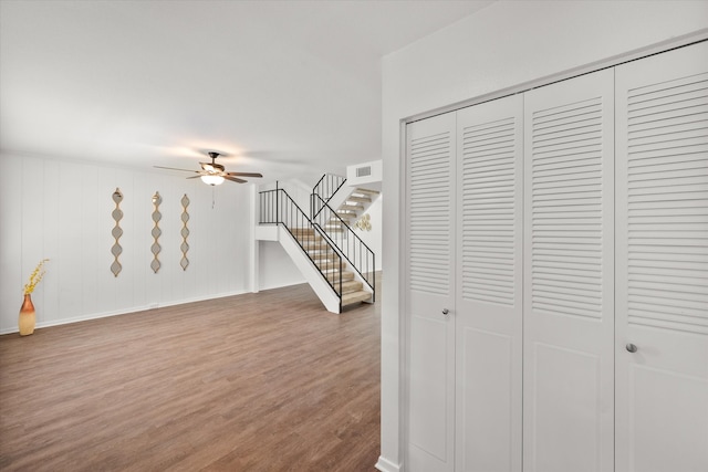 interior space featuring ceiling fan and hardwood / wood-style floors