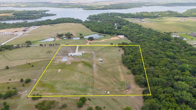 bird's eye view featuring a rural view and a water view