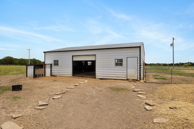 view of outbuilding with a garage