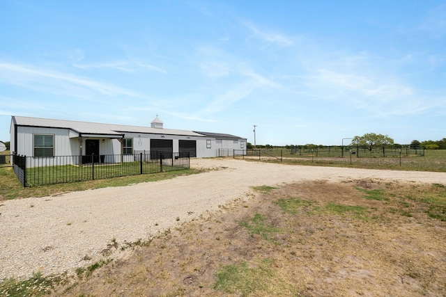 view of front of property with a front lawn