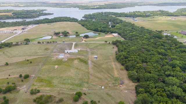 aerial view with a rural view and a water view