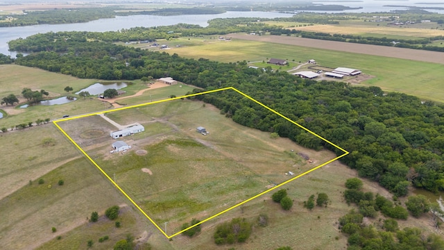 bird's eye view featuring a rural view and a water view