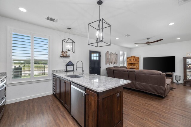 kitchen featuring stainless steel dishwasher, ceiling fan with notable chandelier, sink, decorative light fixtures, and dark hardwood / wood-style floors