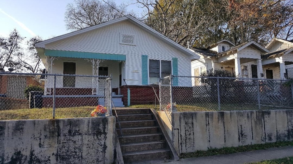 bungalow-style home with a porch