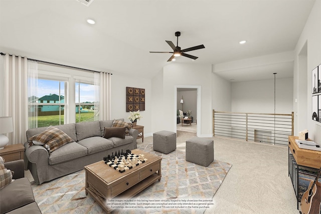 carpeted living room with ceiling fan