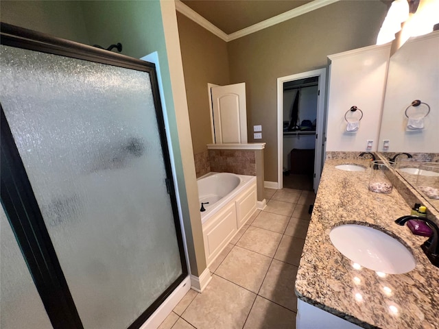 bathroom featuring crown molding, vanity, plus walk in shower, and tile patterned flooring