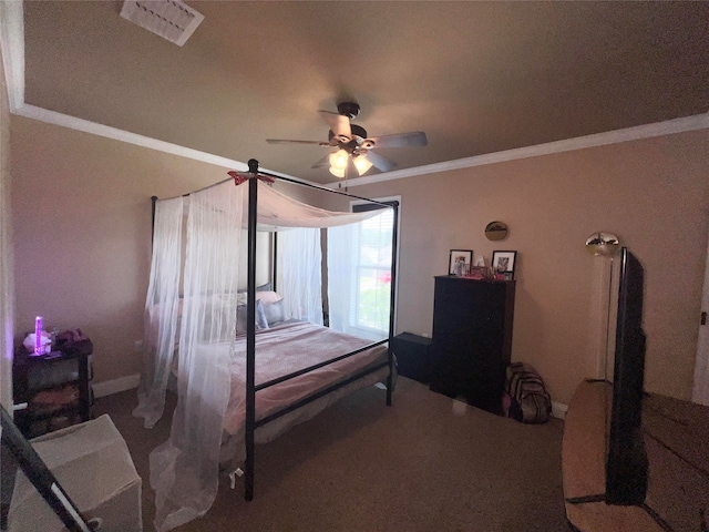 carpeted bedroom with ornamental molding and ceiling fan