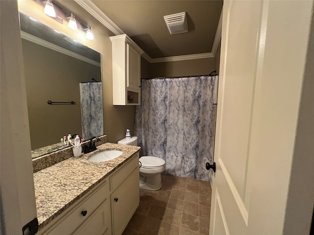 bathroom featuring tile patterned floors, ornamental molding, toilet, and vanity