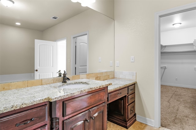 bathroom featuring vanity