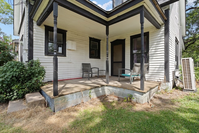 back of house with covered porch