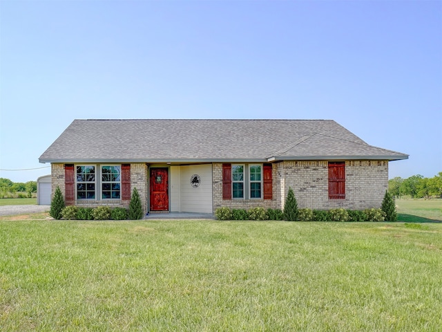 ranch-style home with a front yard