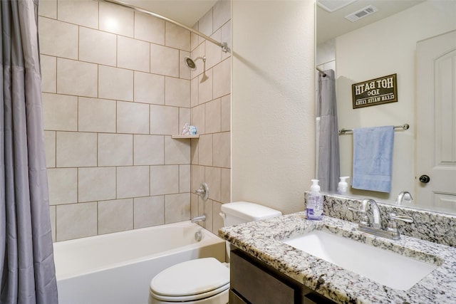 full bathroom featuring shower / bath combination with curtain, vanity, and toilet