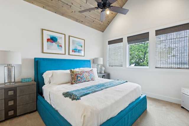 bedroom with vaulted ceiling, wood ceiling, carpet floors, and ceiling fan