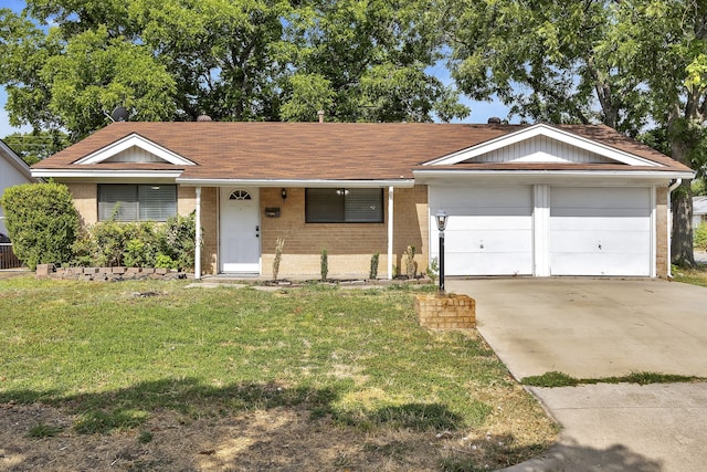 single story home featuring a garage and a front yard