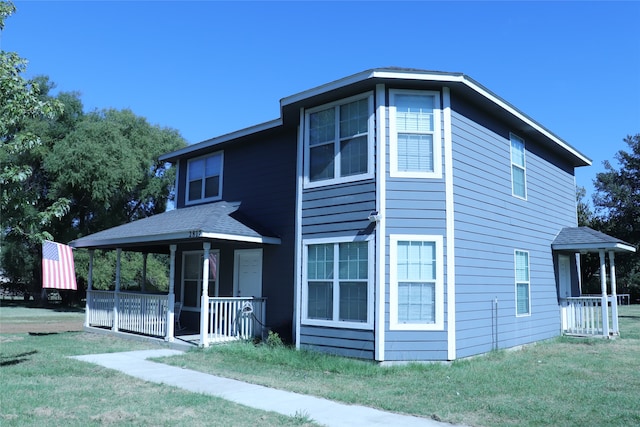 view of front of property with a front lawn