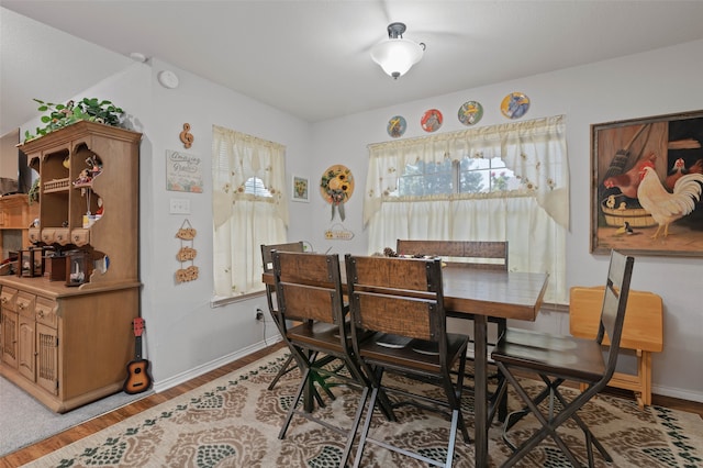 dining room featuring hardwood / wood-style flooring