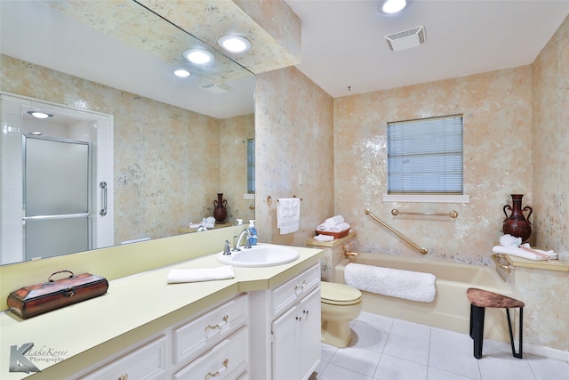 full bathroom with tile patterned flooring, vanity, toilet, and independent shower and bath