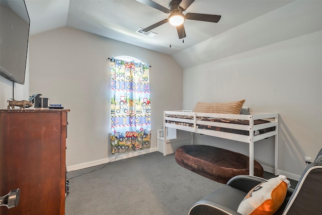 carpeted bedroom featuring vaulted ceiling and ceiling fan