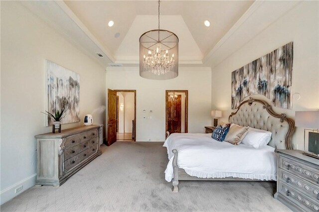 carpeted bedroom featuring an inviting chandelier, a raised ceiling, and high vaulted ceiling