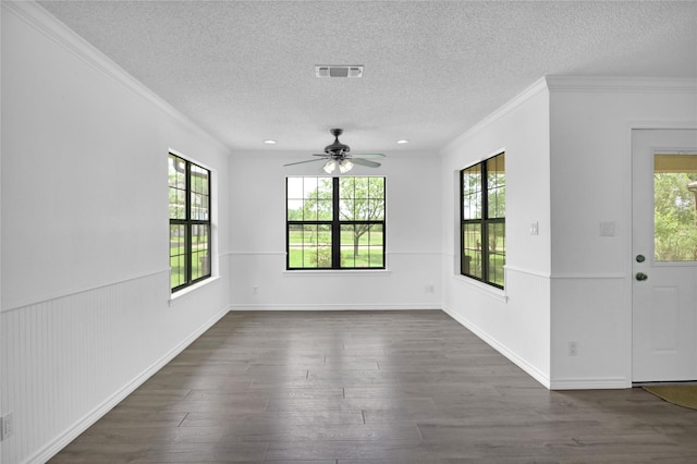 1972 Farm Rd Unit 3134, Cumby, TX 75433 - unfurnished room with healthy amount of natural light, ornamental molding, dark wood finished floors, and a textured ceiling